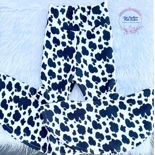 Black Cow Print Bell Bottoms