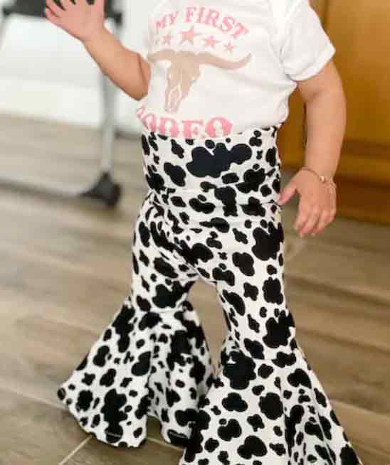 Black Cow Print Bell Bottoms